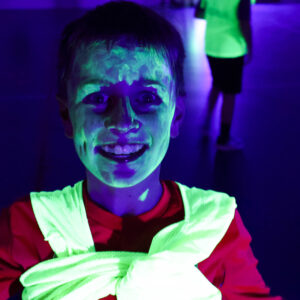 boy with neon paint